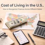 Cost of living in the U.S. concept with dollar bills on a map, calculator, smartphone budget app, and financial planning tools on a desk representing managing finances across different states